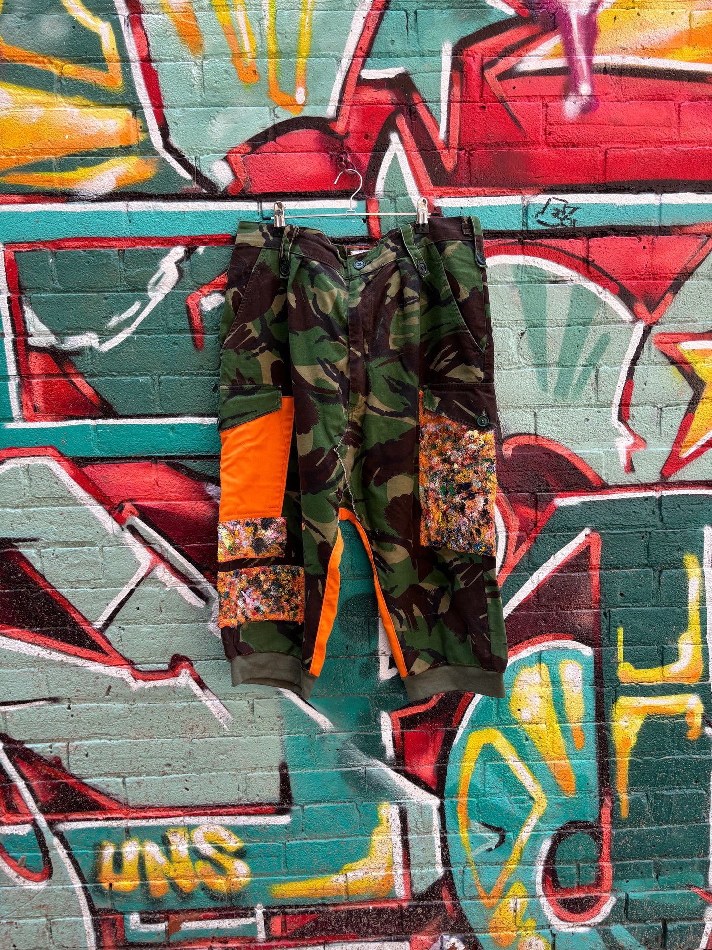 WORN BY ASHES SPRING 24’ FASHION SHOW - CAMO REVAMP PANTS - 36” ( adjustable buckles )