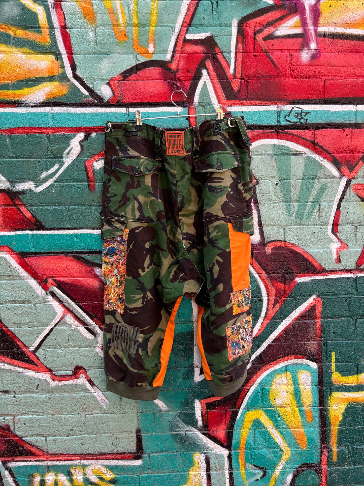 WORN BY ASHES SPRING 24’ FASHION SHOW - CAMO REVAMP PANTS - 36” ( adjustable buckles )