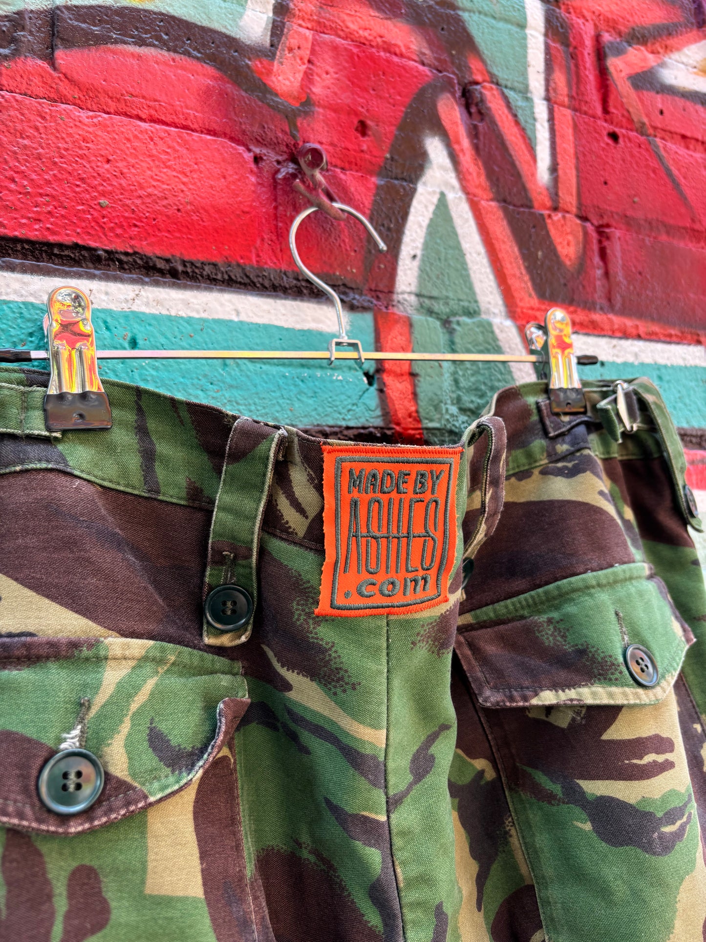 WORN BY ASHES SPRING 24’ FASHION SHOW - CAMO REVAMP PANTS - 36” ( adjustable buckles )